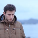 man pondering life's meaning and purpose